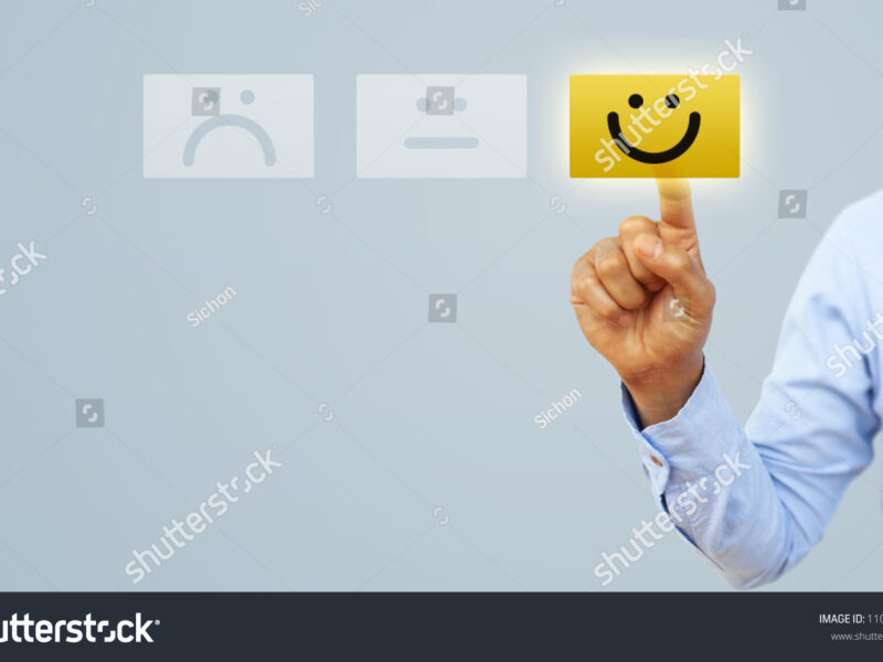 stock-photo-hand-of-client-show-a-feedback-with-smiley-face-card-service-rating-satisfaction-concept-1107710531